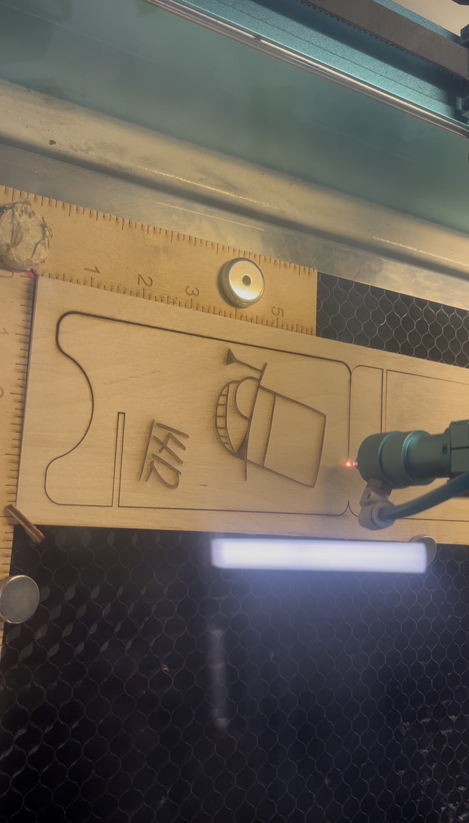 Design undergoing laser cutting